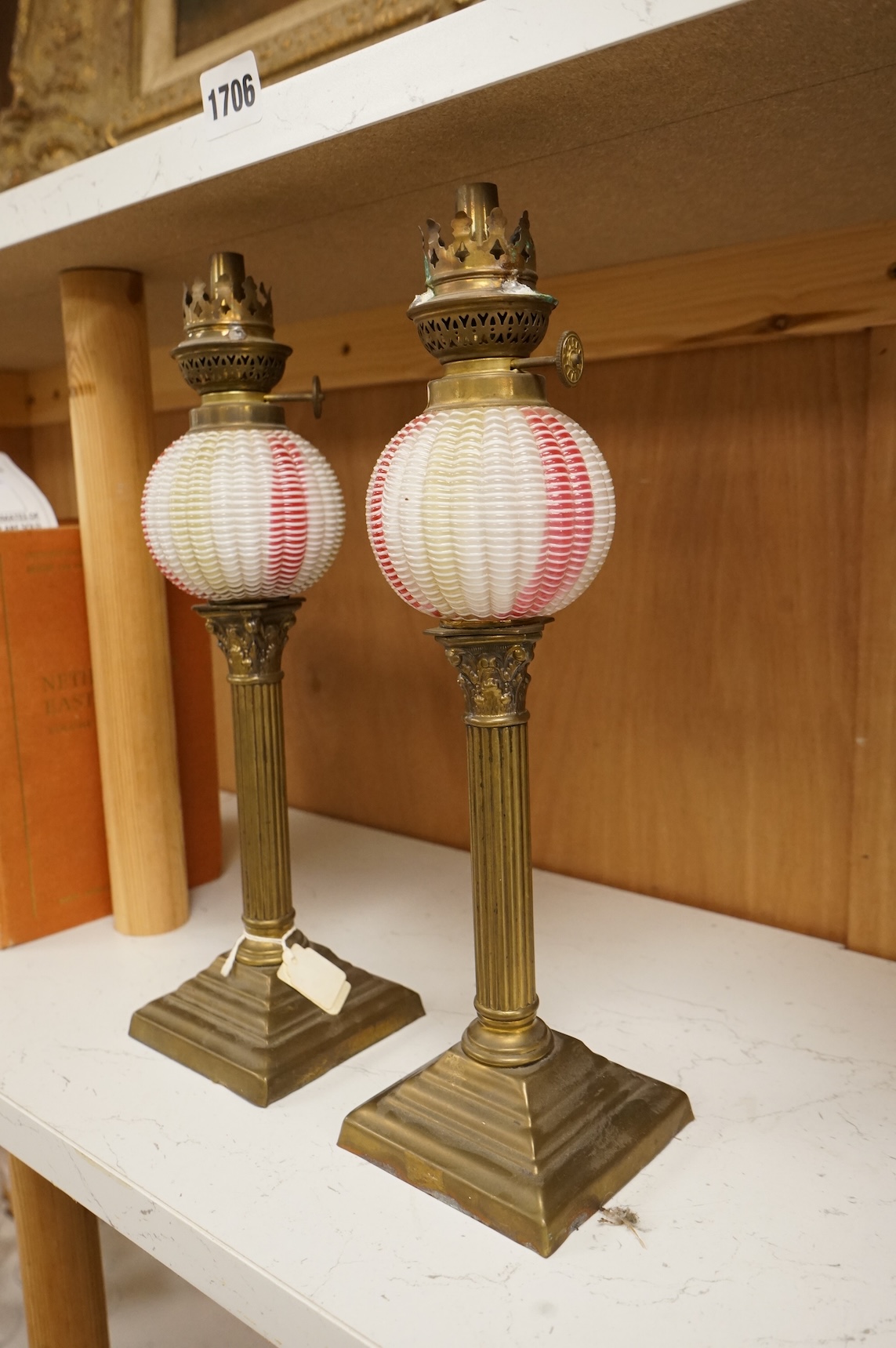 A pair of Victorian brass oil lamps with Webb style reservoirs, 33cm high